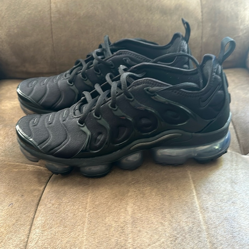 Pair of women’s size 9.5 vapormax plus Nike shoes